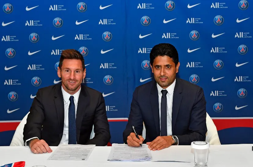 Lionel Messi junto al presidente del PSG